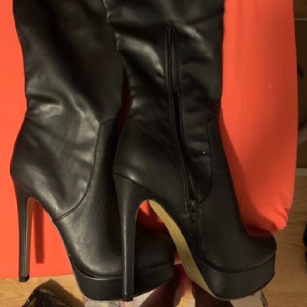 Knee high, high heel boots